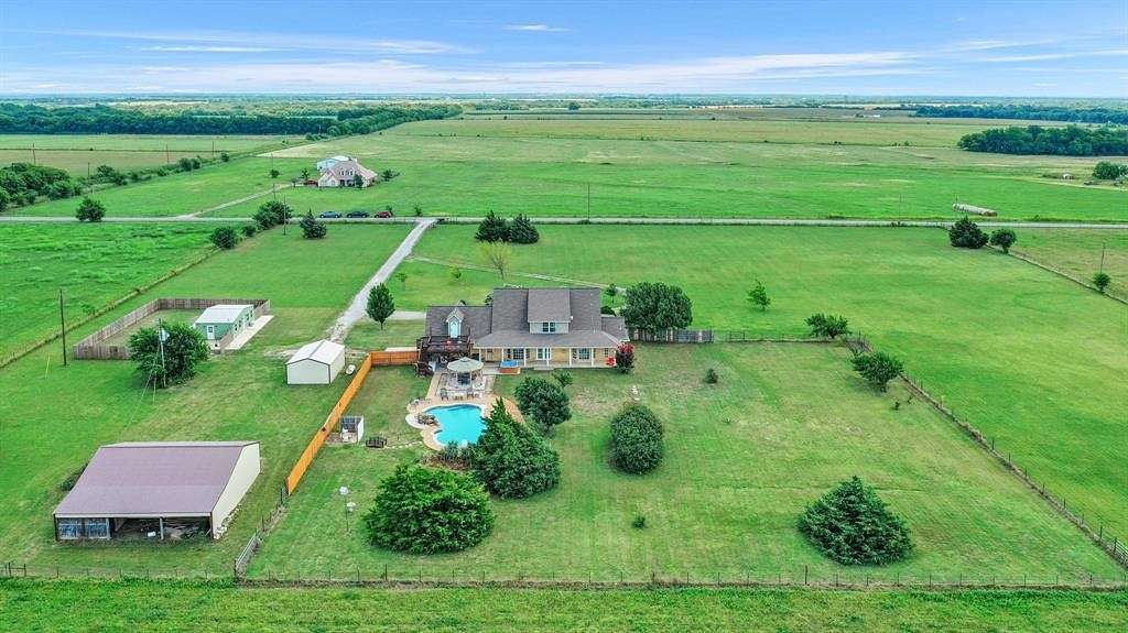 4.4 Acres of Residential Land with Home for Sale in Whitewright, Texas