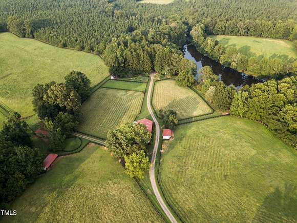 80.9 Acres of Agricultural Land with Home for Sale in Oxford, North Carolina