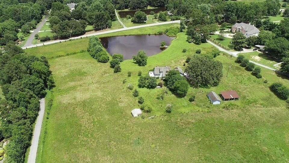 13.1 Acres of Land with Home for Sale in Buford, Georgia
