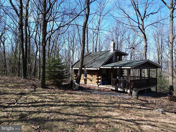 13.5 Acres of Recreational Land with Home for Auction in Loysville, Pennsylvania