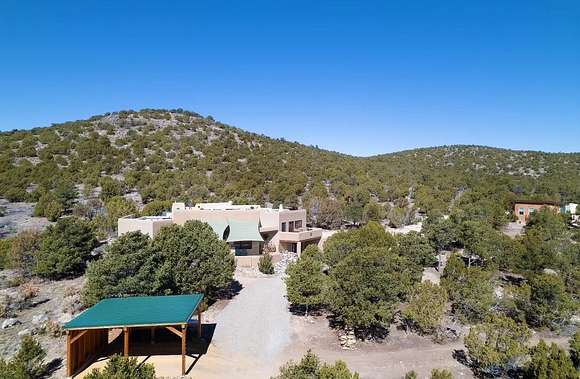 5 Acres of Land with Home for Sale in Arroyo Hondo, New Mexico