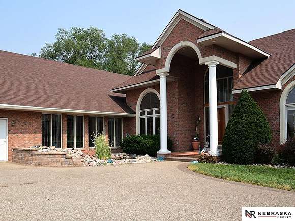 11.2 Acres of Land with Home for Sale in Bennington, Nebraska