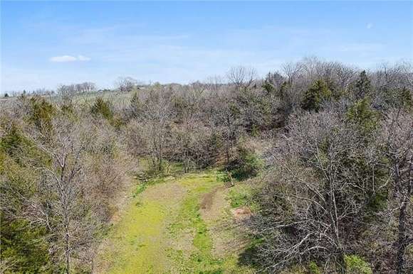 26.6 Acres of Agricultural Land with Home for Sale in Platte City, Missouri