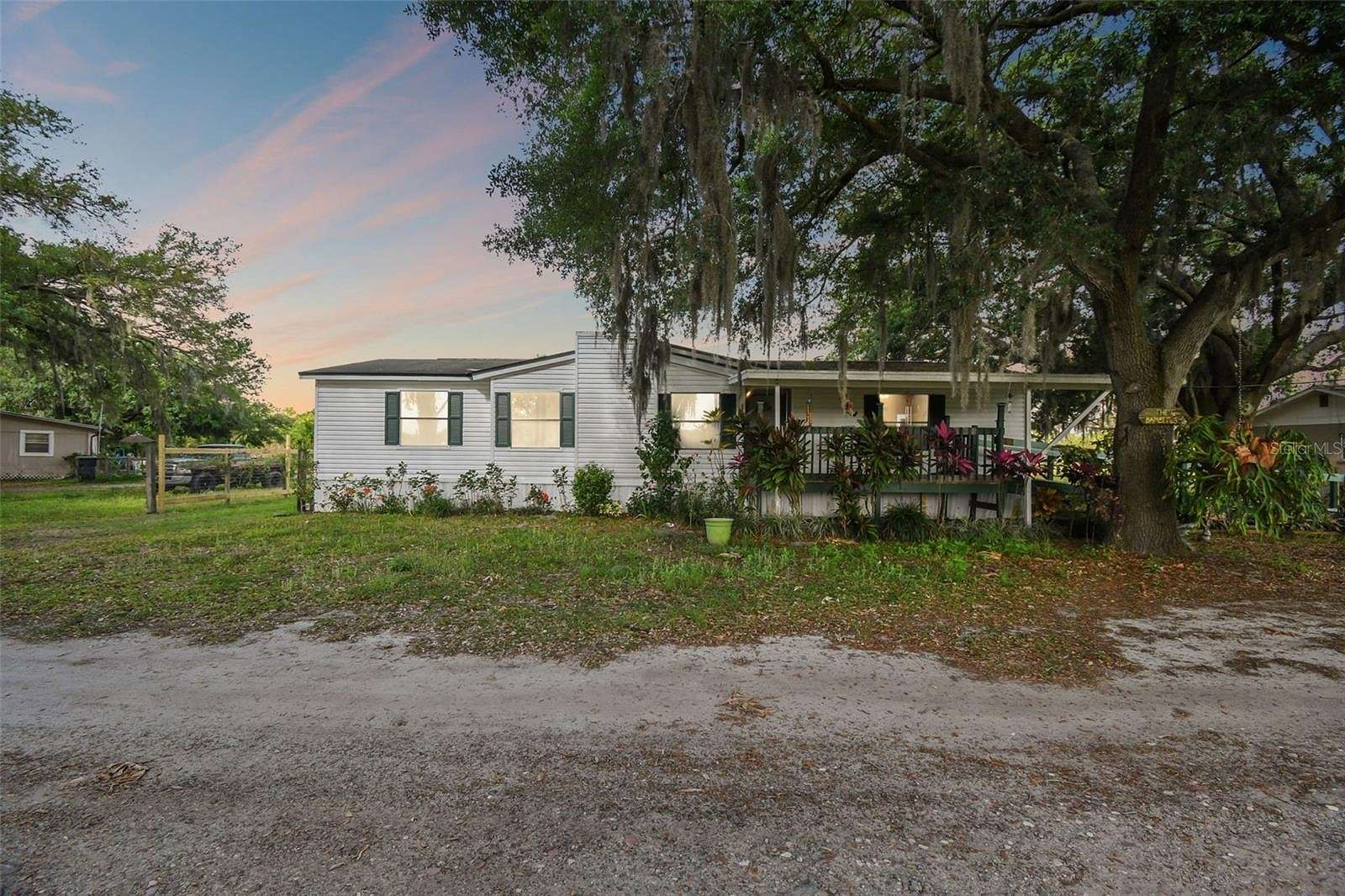 2.4 Acres of Residential Land with Home for Sale in Auburndale, Florida