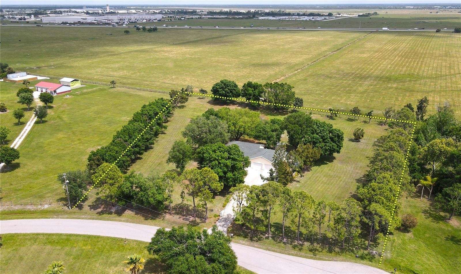 2.5 Acres of Residential Land with Home for Sale in Punta Gorda, Florida