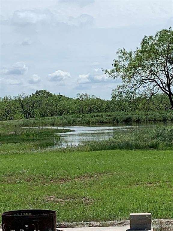 65 Acres of Agricultural Land with Home for Sale in Carbon, Texas