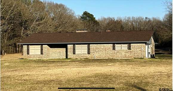 13.1 Acres of Land with Home for Sale in De Kalb, Texas