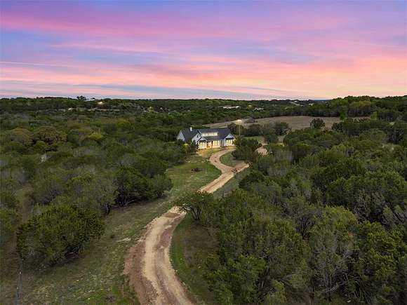 5.1 Acres of Residential Land with Home for Sale in Bluff Dale, Texas
