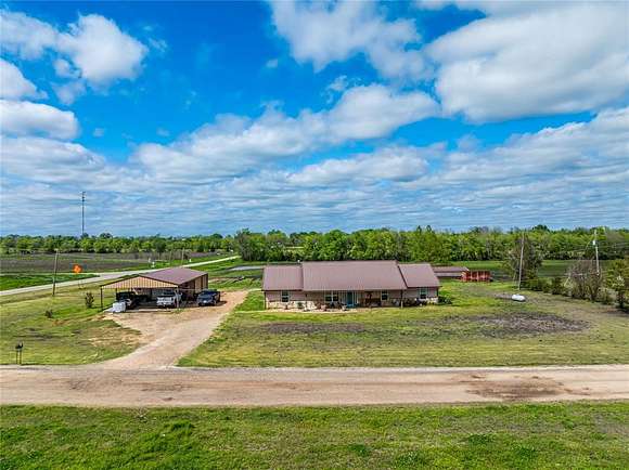 30.7 Acres of Land with Home for Sale in Deport, Texas