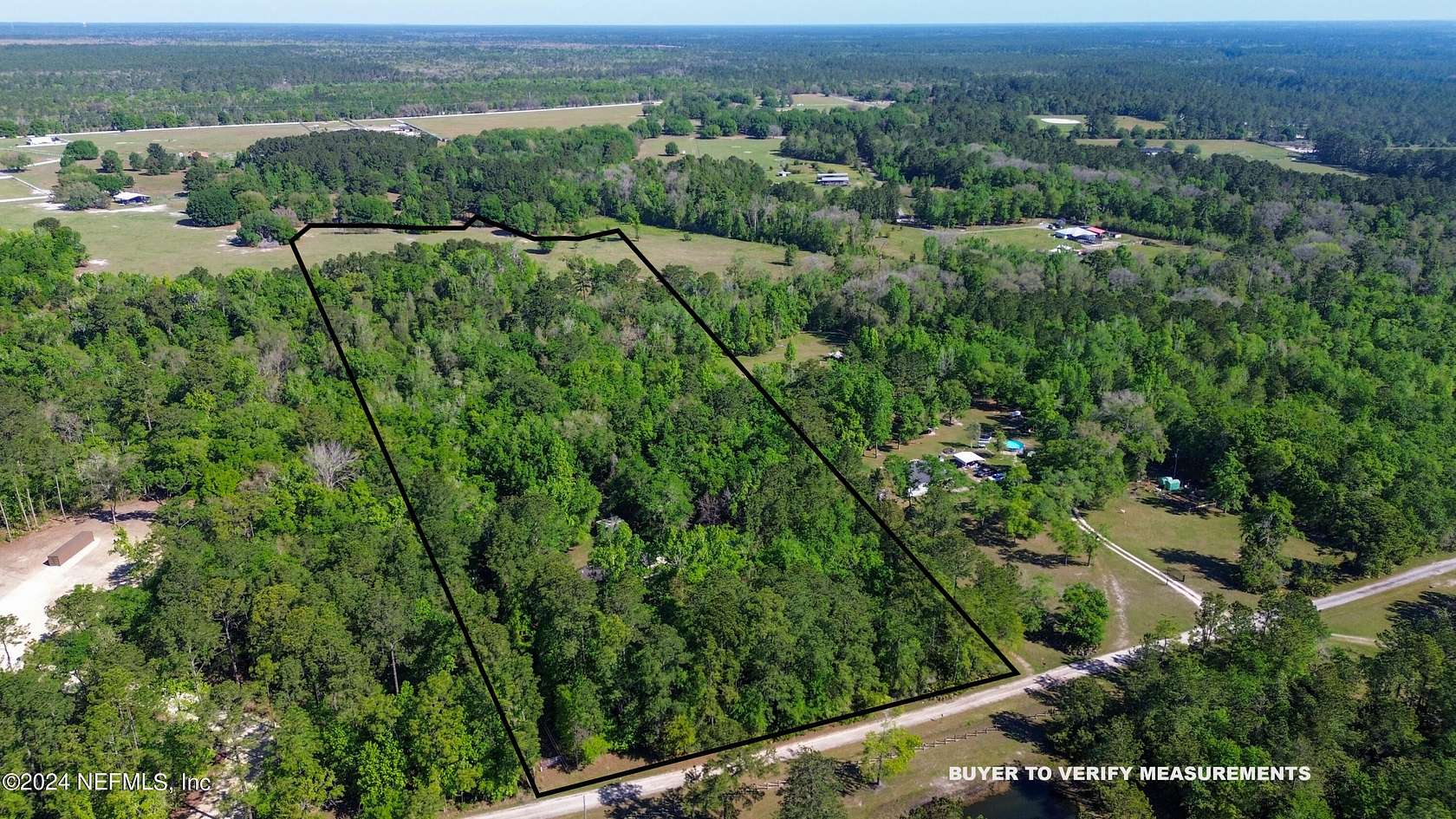 4.9 Acres of Residential Land with Home for Sale in Keystone Heights, Florida