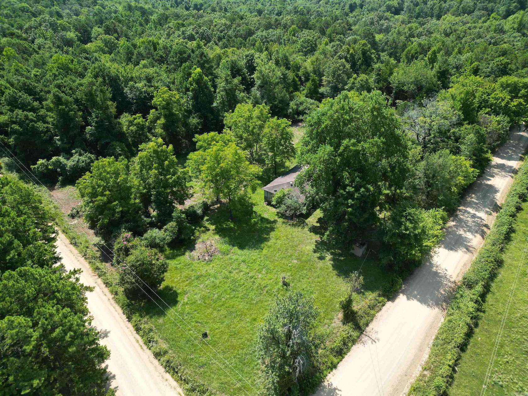 8 Acres of Residential Land with Home for Sale in Cove, Arkansas