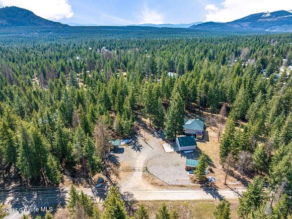 5.1 Acres of Residential Land with Home for Sale in Spirit Lake, Idaho