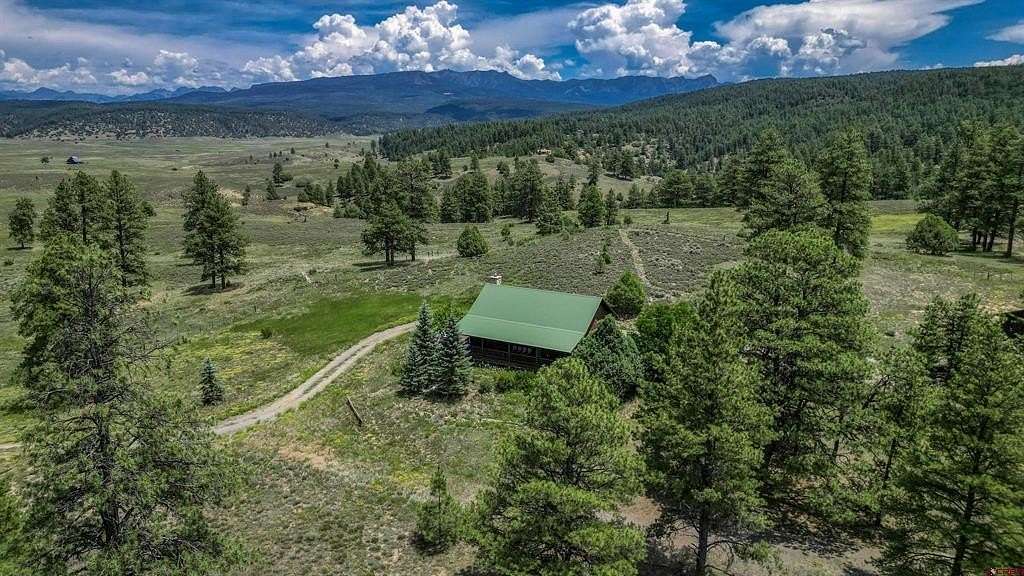 70.36 Acres of Land with Home for Sale in Pagosa Springs, Colorado