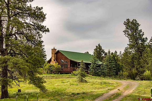 70.36 Acres of Land with Home for Sale in Pagosa Springs, Colorado