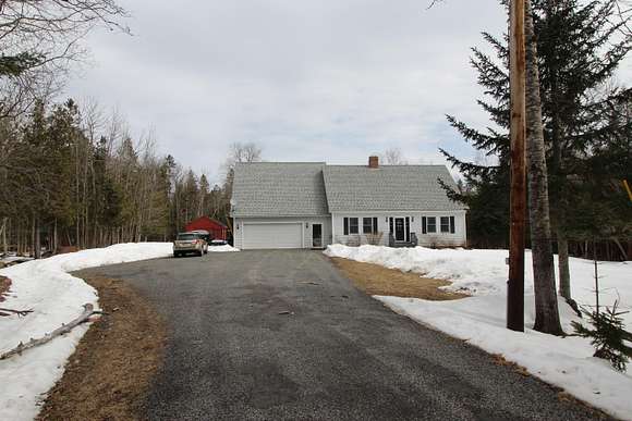 2.2 Acres of Residential Land with Home for Sale in Rangeley, Maine