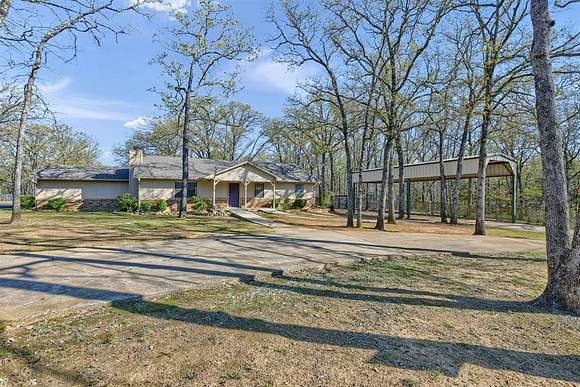 6.6 Acres of Residential Land with Home for Sale in Denison, Texas