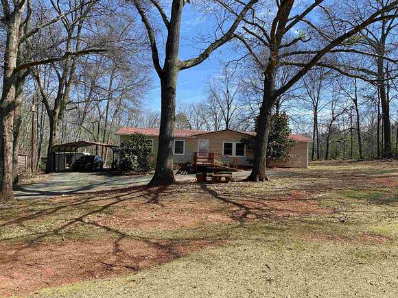 6.2 Acres of Residential Land with Home for Sale in Wellford, South Carolina