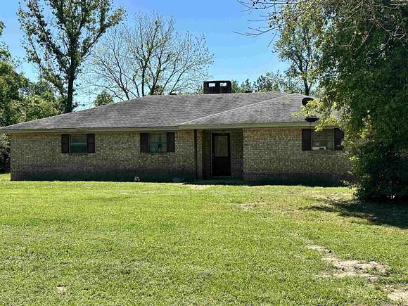 17.3 Acres of Land with Home for Sale in Hillister, Texas