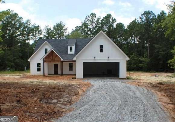 3.9 Acres of Residential Land with Home for Sale in Rentz, Georgia