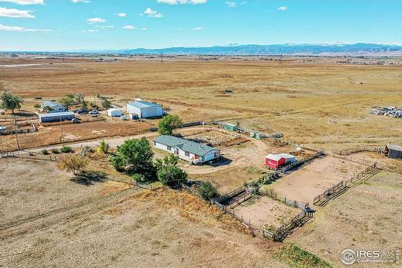 35 Acres of Agricultural Land with Home for Sale in Wellington, Colorado
