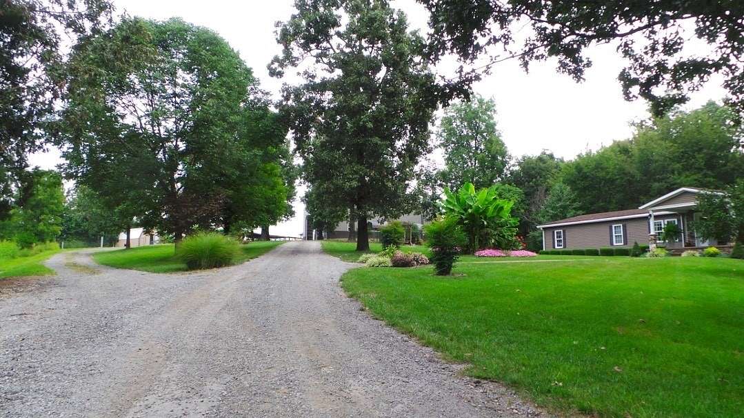 34 Acres of Agricultural Land with Home for Sale in Crofton, Kentucky