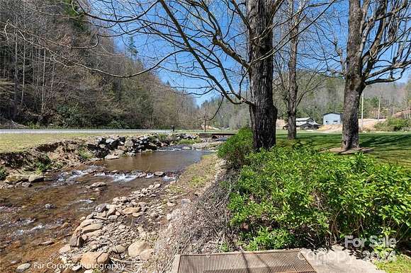 36.1 Acres of Land with Home for Sale in Marshall, North Carolina