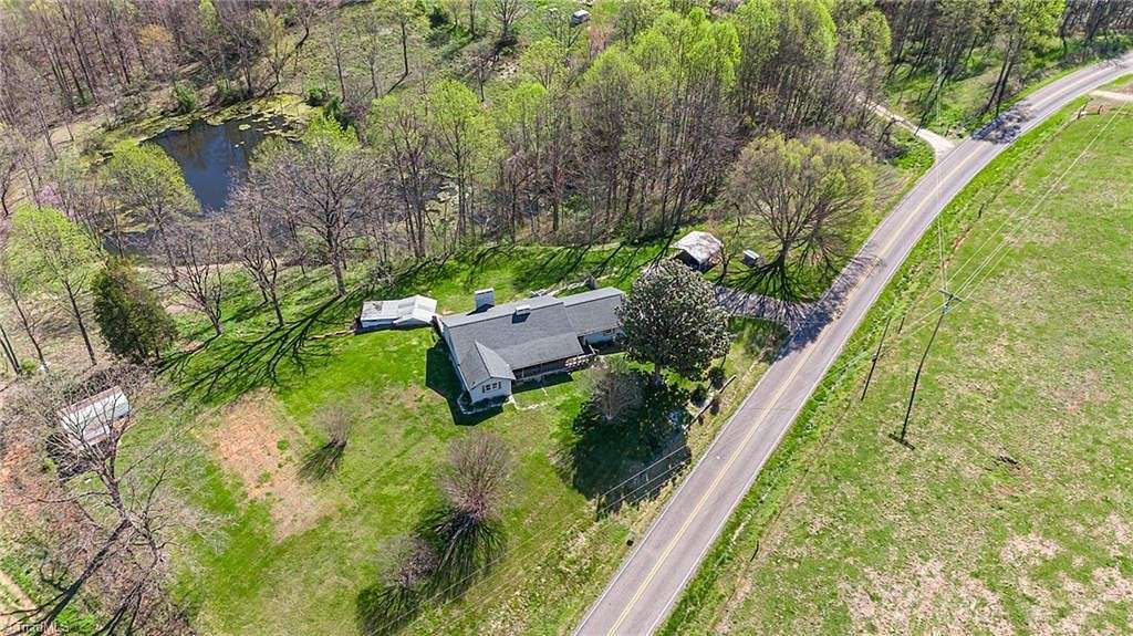 8.8 Acres of Land with Home for Sale in Dobson, North Carolina