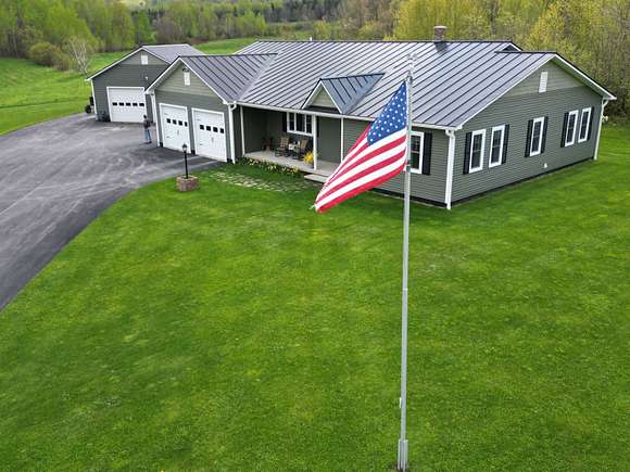 3.93 Acres of Residential Land with Home for Sale in Barton, Vermont