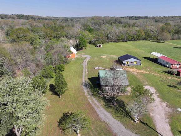6.7 Acres of Residential Land with Home for Sale in Glenwood, Arkansas