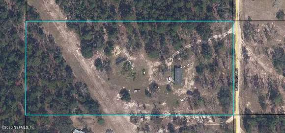 4.8 Acres of Residential Land with Home for Sale in Keystone Heights, Florida
