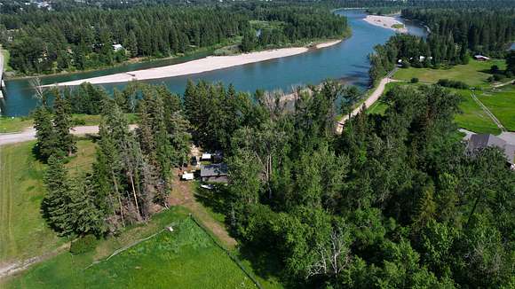 12.6 Acres of Land with Home for Sale in Columbia Falls, Montana