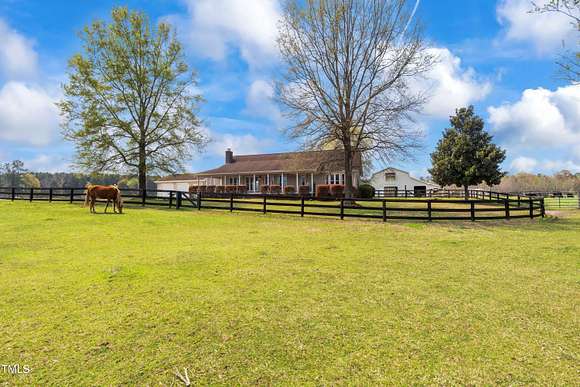 71.3 Acres of Land with Home for Sale in Coats, North Carolina
