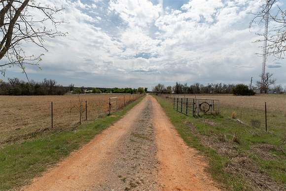 155 Acres of Agricultural Land with Home for Sale in Carney, Oklahoma