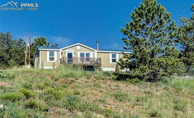 5 Acres of Residential Land with Home for Sale in Hartsel, Colorado