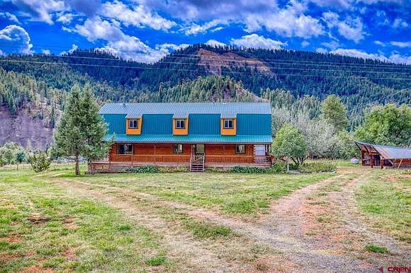 2.9 Acres of Residential Land with Home for Sale in Pagosa Springs, Colorado