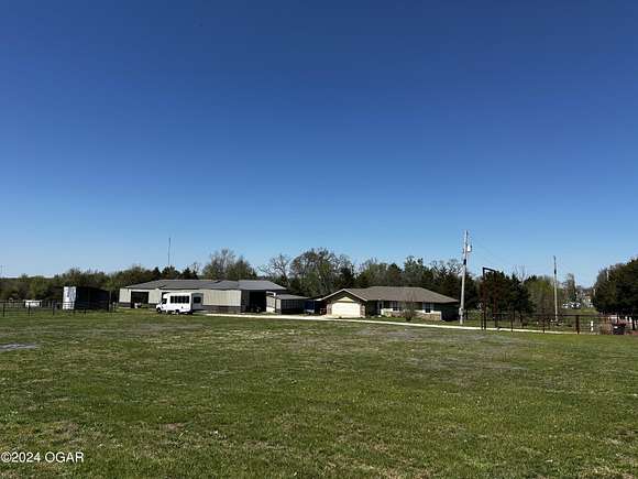 10 Acres of Land with Home for Sale in Cassville, Missouri