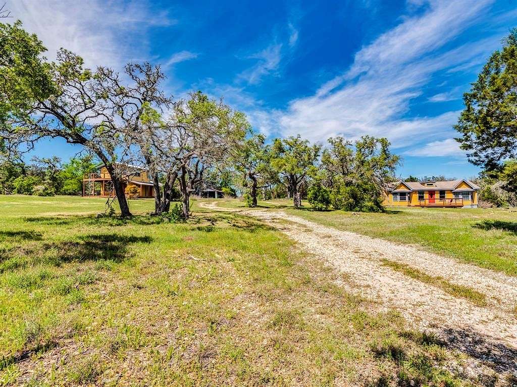 9.8 Acres of Land with Home for Sale in Driftwood, Texas