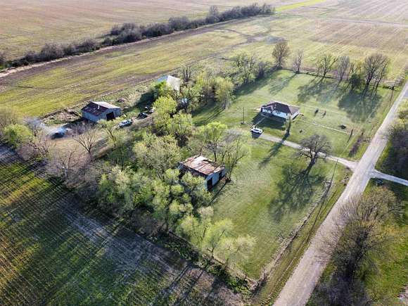 4.9 Acres of Residential Land with Home for Sale in Windsor, Missouri
