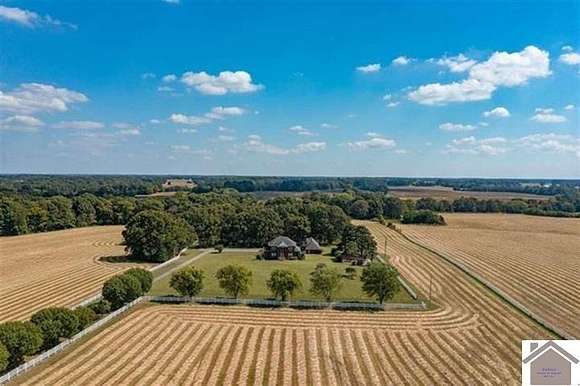 51.9 Acres of Agricultural Land with Home for Sale in Murray, Kentucky