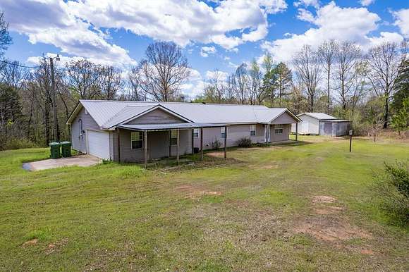 10 Acres of Residential Land with Home for Sale in Coffeeville, Mississippi
