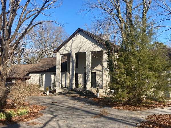 142 Acres of Land with Home for Sale in Calera, Alabama