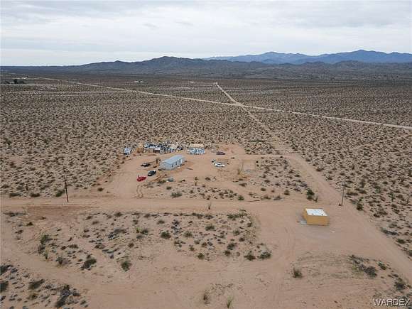 2.5 Acres of Residential Land with Home for Sale in Yucca, Arizona