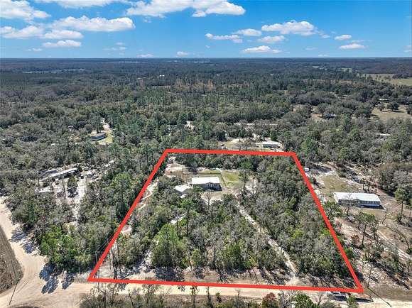 3.6 Acres of Residential Land with Home for Sale in Chiefland, Florida