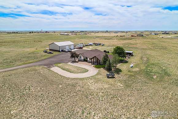 29.3 Acres of Recreational Land with Home for Sale in Wiggins, Colorado