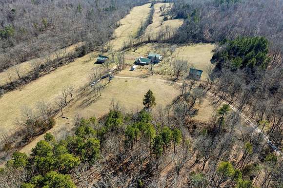 230 Acres of Land with Home for Sale in Bunker, Missouri