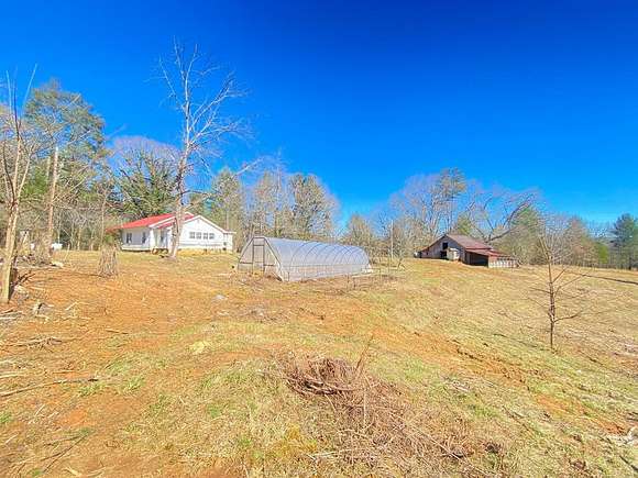 11.9 Acres of Land with Home for Sale in Mineral Bluff, Georgia