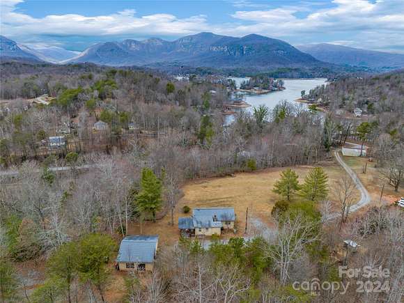 6.6 Acres of Residential Land with Home for Sale in Lake Lure, North Carolina