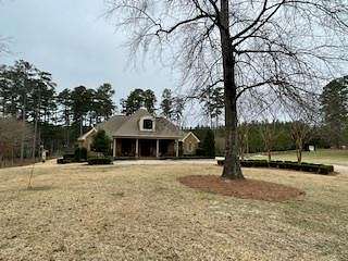 9.6 Acres of Residential Land with Home for Sale in Bay Springs, Mississippi
