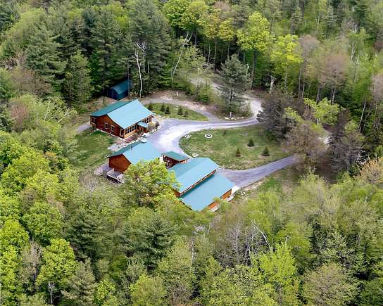 10.3 Acres of Land with Home for Sale in Claremont, New Hampshire