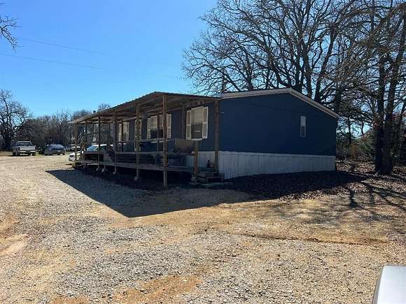5 Acres of Residential Land with Home for Sale in Blum, Texas